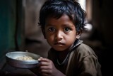 Hungry, starving, poor little child looking at the camera. Generative AI