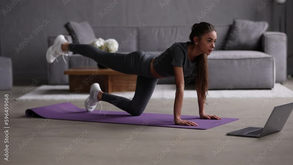 Young fit woman side plank legs exercises exercises at home Young fit woman side plank legs exercises exercises at home