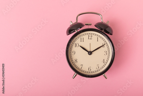 Alarm clock on color background.Good morning concept. Morning time concept. retro alarm clock on background. WAKE UP. Good morning. flat lay.Banner.