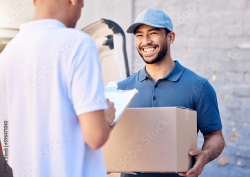 Customer service comes first. Shot of a young man receiving his delivery from the courier. © Azeemud/peopleimages.com