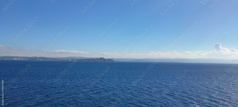 Fototapeta premium View of Sardegna from the ocean on a boat