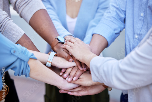 Uplifting one another to great success. Shot of a group of business people with their hands stacked. © Michael C/peopleimages.com