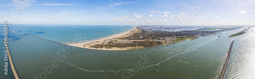 aerial panorama view of the landscape around the Maasvlakte a massive man-made extension of Europoort port and industrial facility within Port of Rotterdam in the Netherlands. High quality photo