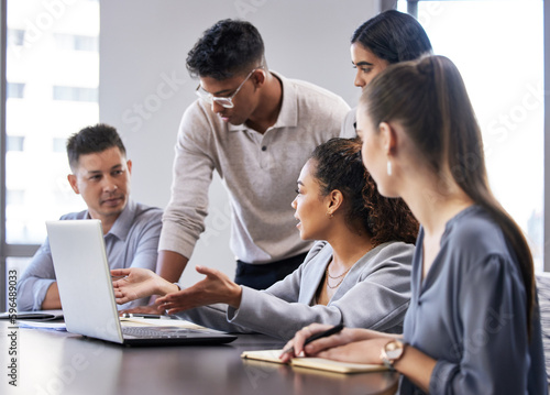 Lets go with this one. Shot of a group of businesspeople having a meeting in a modern office.