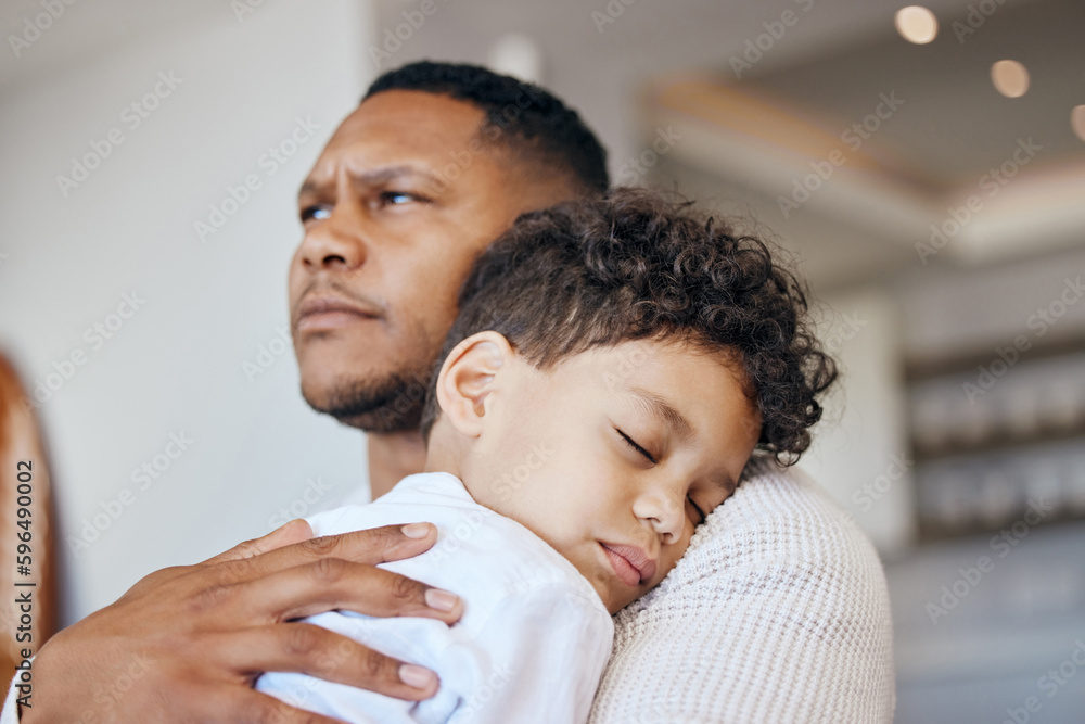 Mixed race boy sleeping on his dads shoulder. Boy feeling safe in fathers arms. Father holding his tired son Mixed race boy sleeping on his dads shoulder. Boy feeling safe in fathers arms. Father holding his tired son