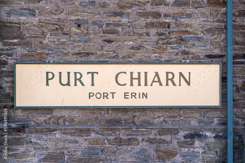 Bilingual signboard in English and Manx of the terminal station of the narrow-gauge steam railroad in Port Erin, Isle of Man