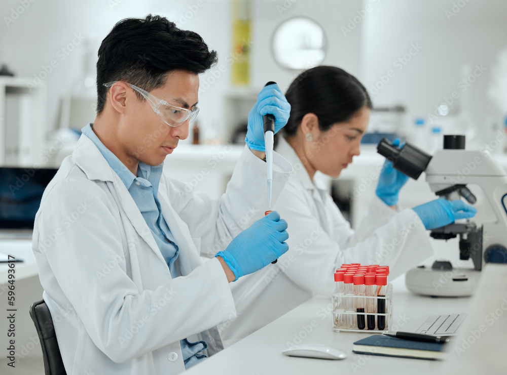 Time to send this off to the lab. Shot of a young man filling a test tube in a lab. Time to send this off to the lab. Shot of a young man filling a test tube in a lab.
