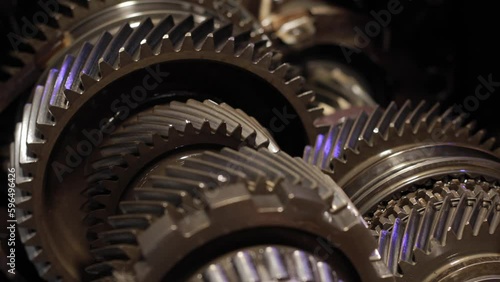 Gear mechanism process Rotating gears. works from within. movable gearbox. Close-up. Gearbox gears isolated