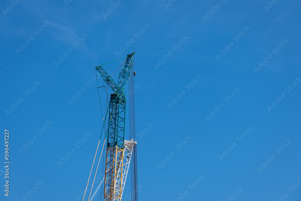 harbor cranes and blue sky background 
