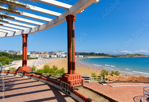 View of sand beach and hotels on sunny day, Santander, Spain