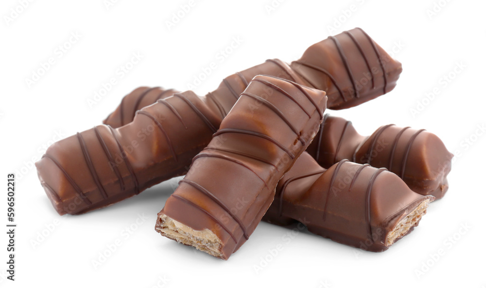 Obraz premium Pieces of tasty chocolate bars on white background