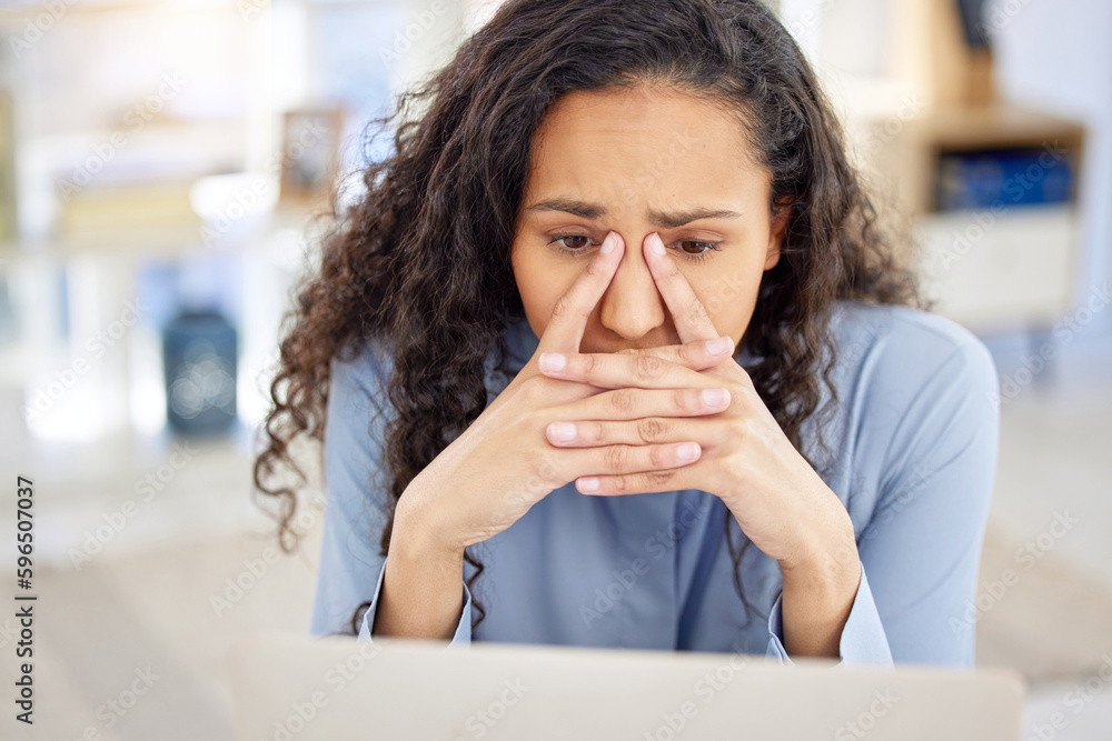 Shes clueless about this challenge. Shot of a young businesswoman looking stressed out while working on a laptop in an office. Shes clueless about this challenge. Shot of a young businesswoman looking stressed out while working on a laptop in an office.