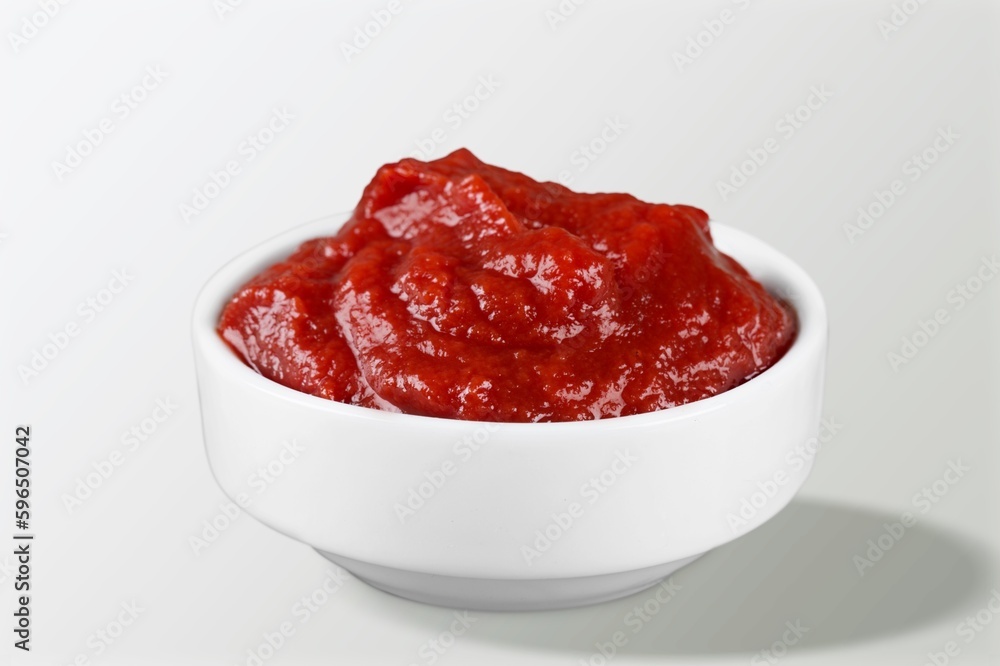 Delicious red ketchup in bowl, tomato sauce Delicious red ketchup in bowl, tomato sauce