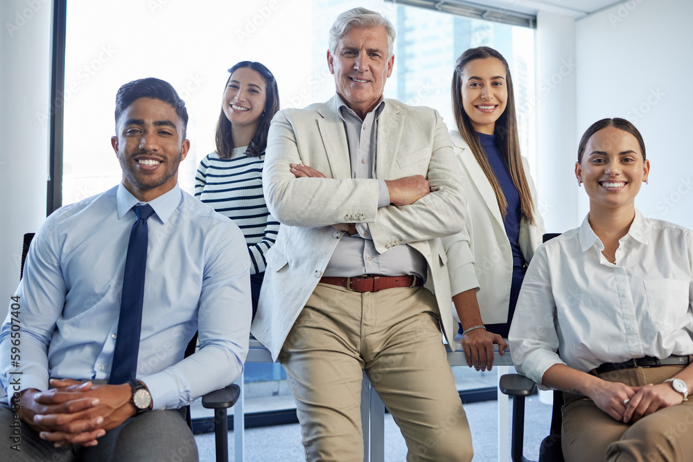 We never back down from a challenge. Shot of a group of businesspeople posing together in an office. We never back down from a challenge. Shot of a group of businesspeople posing together in an office.