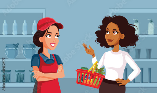 Supermarket Customer Interacting with Saleswoman Vector Cartoon Illustration. Shop assistant responding and guiding a client into the store 
