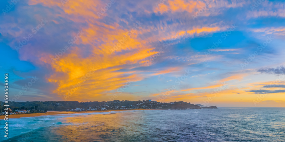 Sunrise at the seaside with high cloud