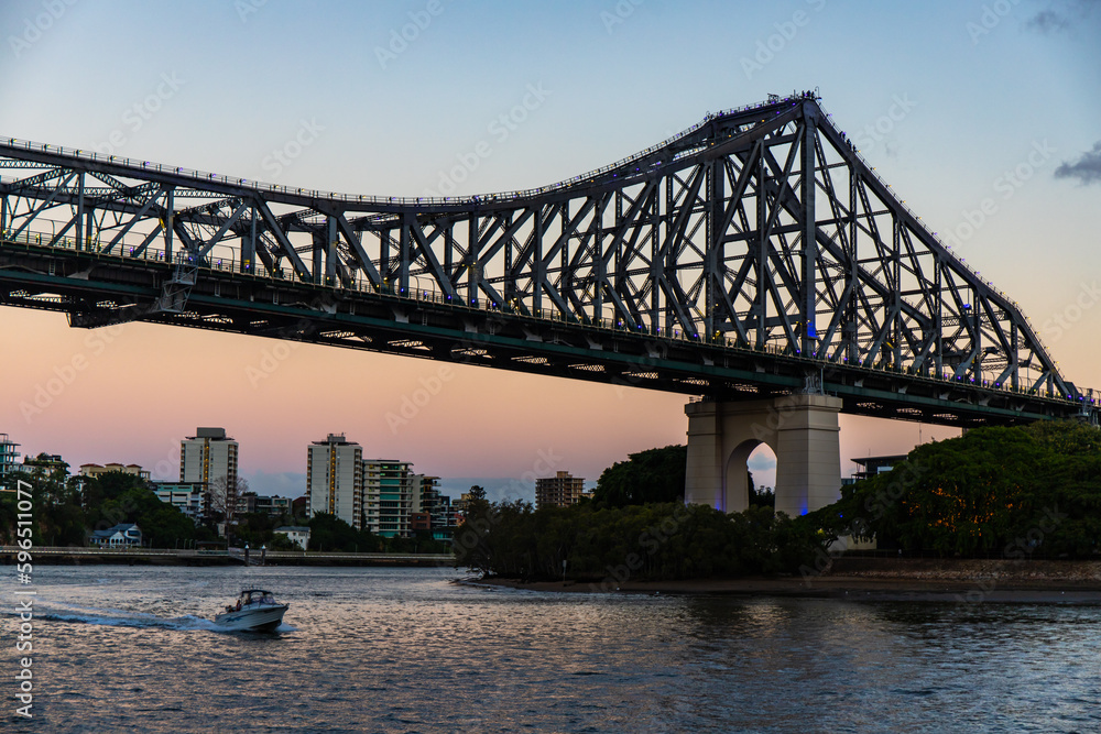 famous story bridge in brisbane at sunset; red sunset over brisbane cbd, queensland, australia famous story bridge in brisbane at sunset; red sunset over brisbane cbd, queensland, australia