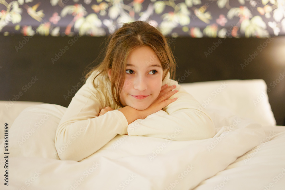 Little cute girl smiling happily in her bed Little cute girl smiling happily in her bed