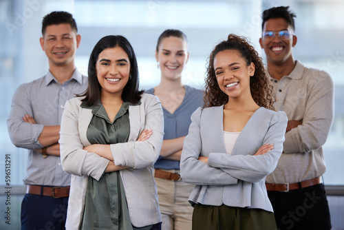 Put us to the test and see why were the best. Portrait of a group of young businesspeople working in a modern office.