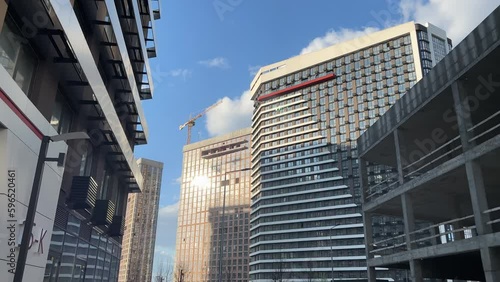 Wallpaper Mural Newly built modern high-rise residential complex exterior with parking garage. Wide angle shot Torontodigital.ca