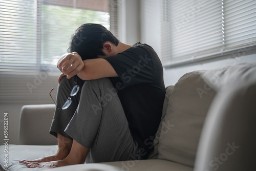 Mental health problem, Sad asian Male anxiety depressed lonely in his home..