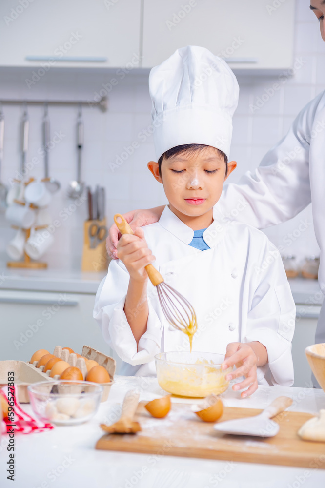 father and son cooking