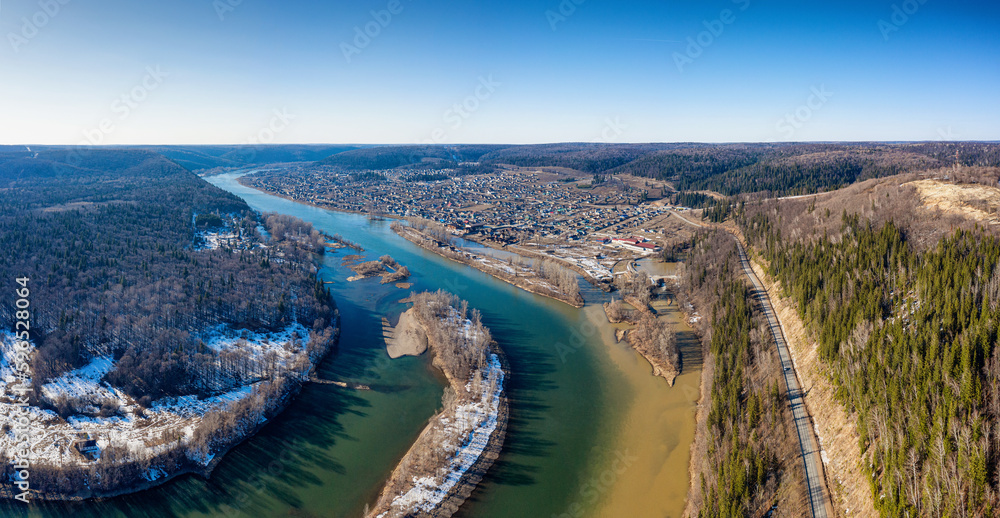 Southern Urals, Krasny Klyuch village. High water on the Ufa River. Aerial view. Southern Urals, Krasny Klyuch village. High water on the Ufa River. Aerial view.