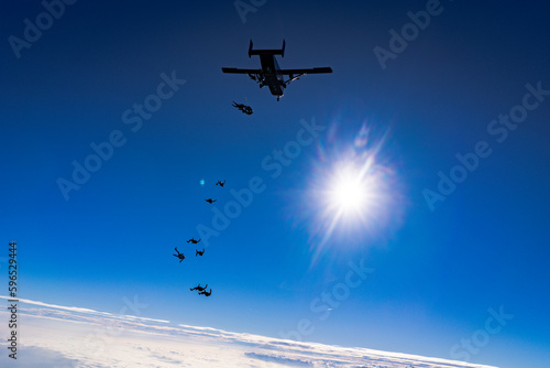 Skydivers Exit Silhouette 