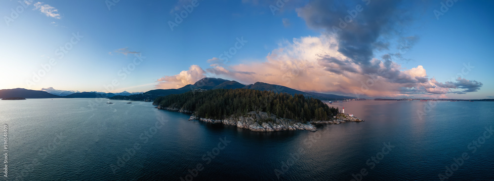 Lighthouse Park in West Vancouver, British Columbia, Canada. Aerial Panoramic Background. Sunny Cloudy Sunset Sky