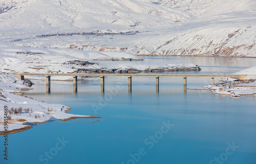 Erzincan Province, İliç District with snowy landscapes, river and historical bridge photo