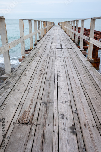 Wooden pier  gazebo with access to the sea.