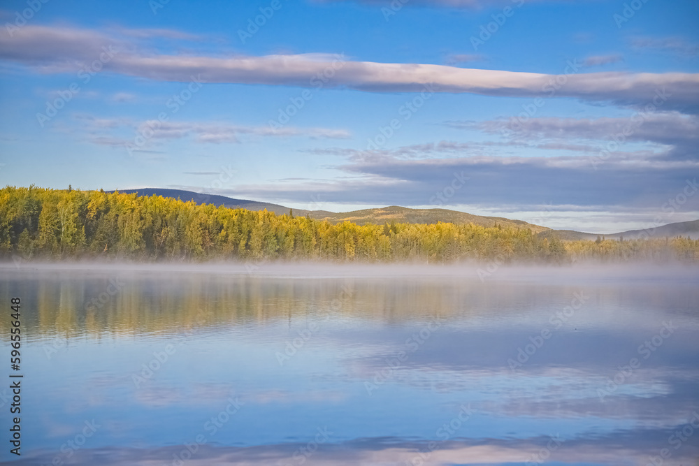 Yukon in Canada, wild landscape in autumn of the Tombstone park, reflection of the trees in a lake at sunrise
Yukon in Canada, wild landscape in autumn of the Tombstone park, reflection of the trees in a lake at sunrise
