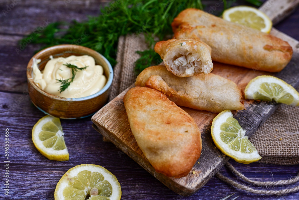 Allasca Pollock Fish Bites in a crispy Tempura Batter.Fish and chips .Close up of crispy breaded