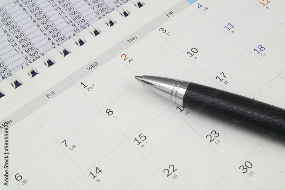 Calendar with pen close up. Planning and time concept. Calendar with pen close up. Planning and time concept.