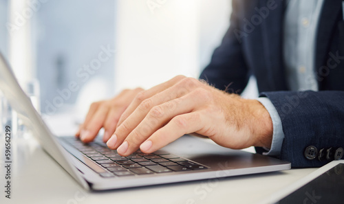 Laptop  closeup and hands of business man in office for research  planning and email. Website  online report and technology with closeup of male employee typing for idea  internet and digital