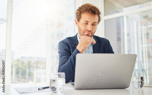 Thinking, laptop and business man in office for focus, research and planning. Communication, technology and internet with male employee contemplating for website, project idea and connection
