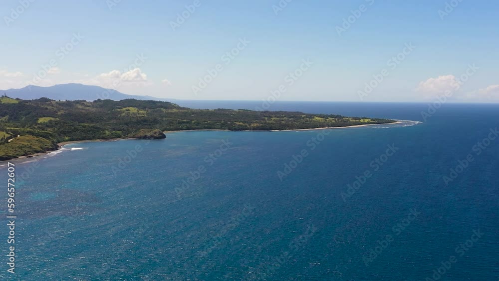 Coast and mountains with forest and jungle.Tropical landscape. Pagudpud, Ilocos Norte, Philippines. Coast and mountains with forest and jungle.Tropical landscape. Pagudpud, Ilocos Norte, Philippines.