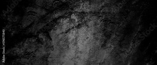 Abstract structured black concrete wall background, scary black grunge goth design. horror black background, Slightly light black concrete cement texture for background.