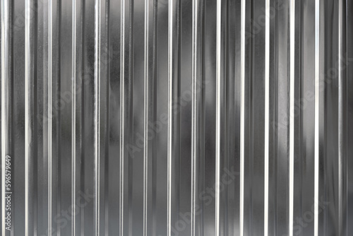 The texture of a steel corrugated sheet is used for fencing