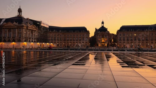 Cinematic footage of Place de la Bourse at sunset in Bordeaux, France. High quality 4k footage photo