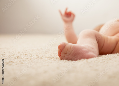 Cute little newborn babies legs, feet and hand 