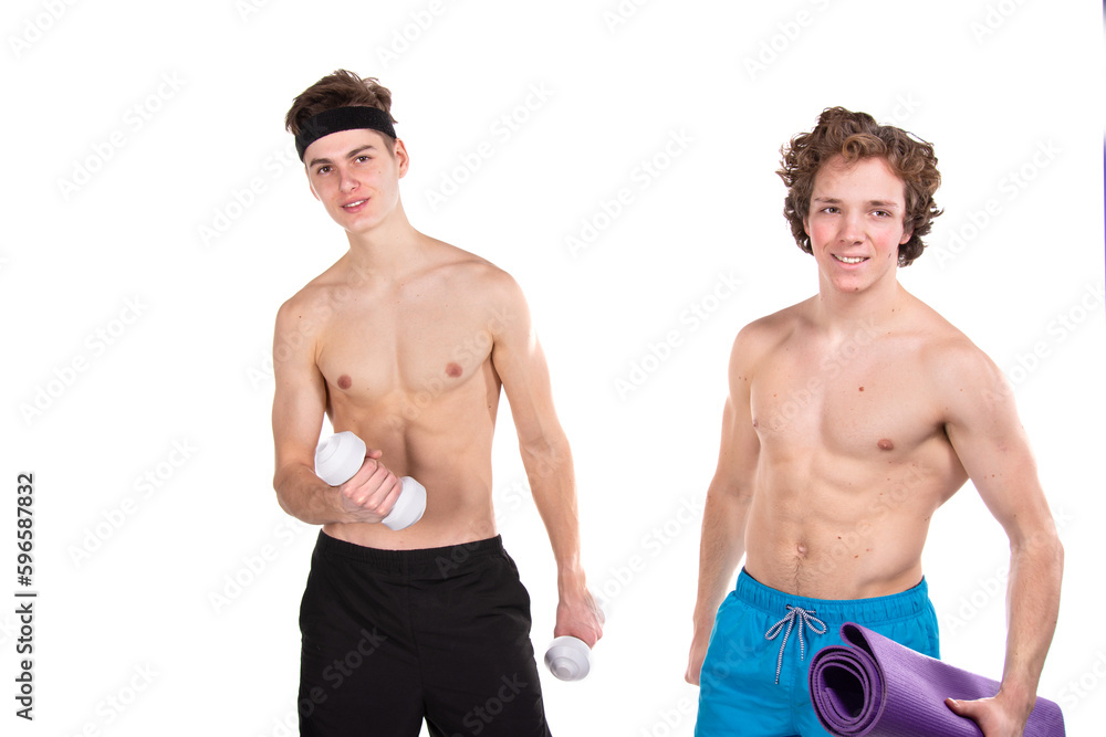 Two young attractive guys go in for sports. White background. Two young attractive guys go in for sports. White background.