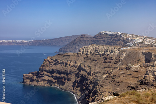 Magnificent view of the majestic volcanic cliffs of Santorini Island, Greece.
