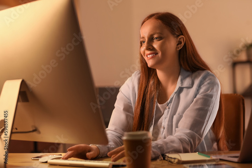 Female programmer working w...