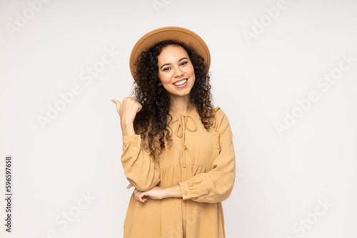 Young woman in dress on white background