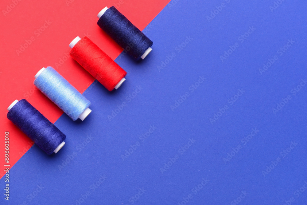 Different sewing threads on color background Different sewing threads on color background