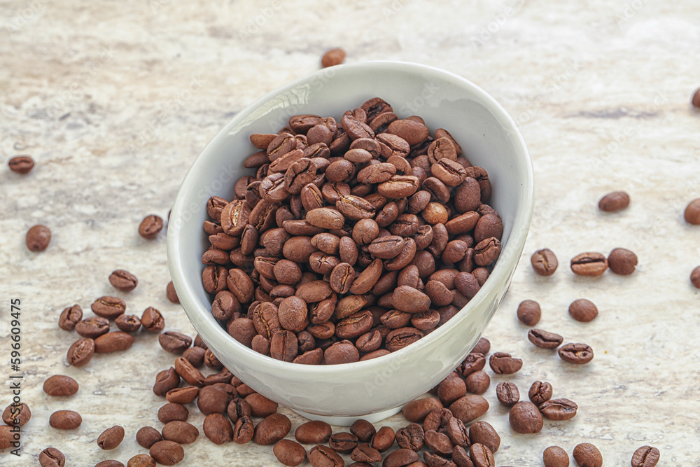 Roasted coffee bean in the bowl Roasted coffee bean in the bowl
