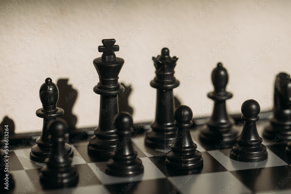 chess pieces on a chessboard chess pieces on a chessboard