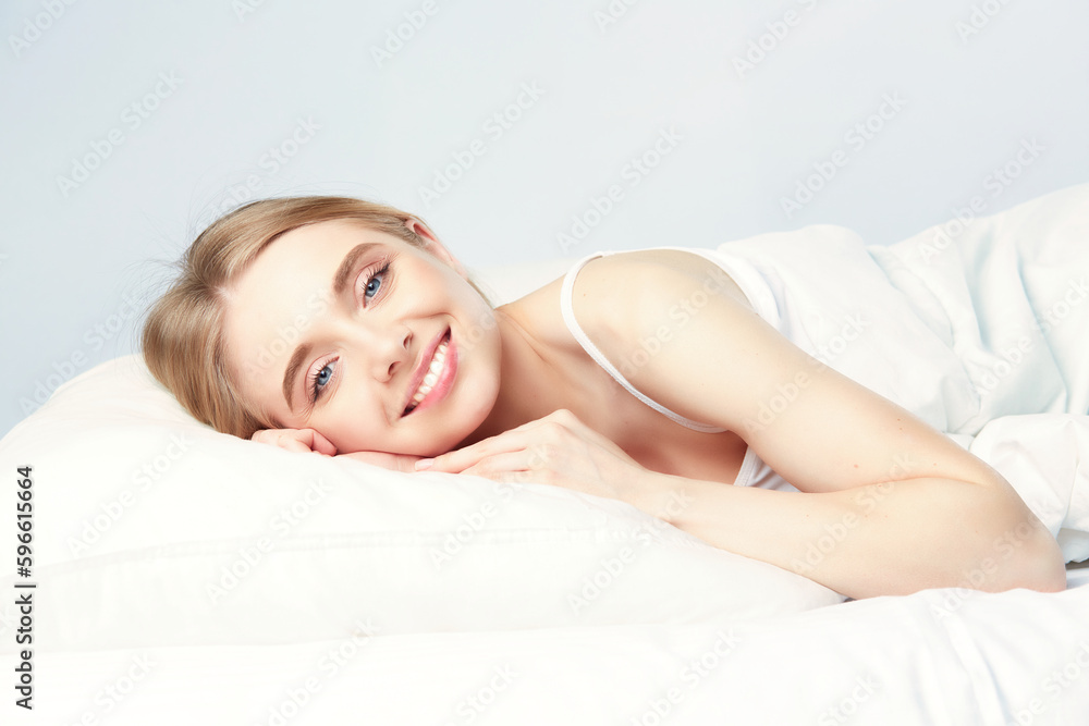 Young beautiful girl sleeps in the bedroom. Young beautiful girl sleeps in the bedroom.
