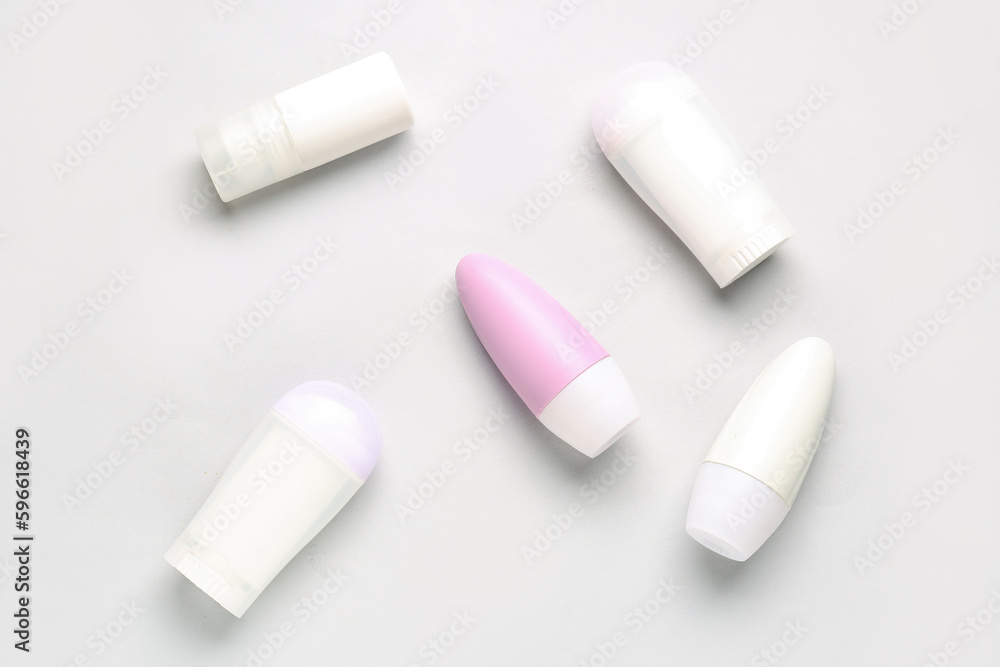 Different deodorant bottles on white background Different deodorant bottles on white background